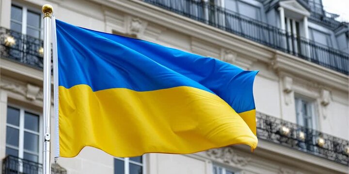 Ukrainian flag waving on flag pole in the wind