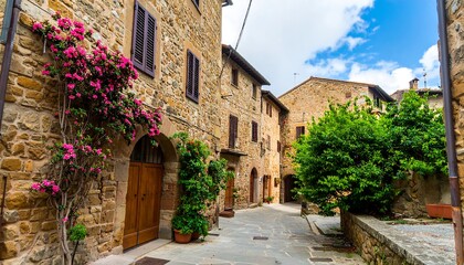 Fototapeta premium Quaint alleyway lined with ancient stone buildings.