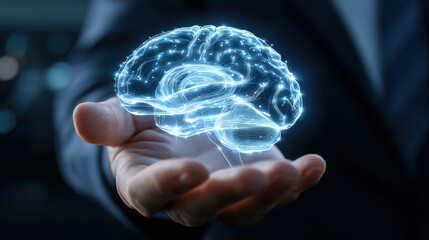 Glowing digital brain is held person hand, symbolizing advanced technology and innovation neuroscience. This represents intersection of human intelligence and artificial intelligence