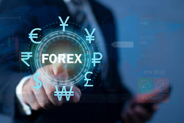 Businessman pressing FOREX icon on virtual screen. Concept about forex currency exchange. Business, internet and technology concept.