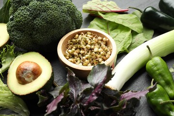 Superfood. Healthy food products on black table, closeup