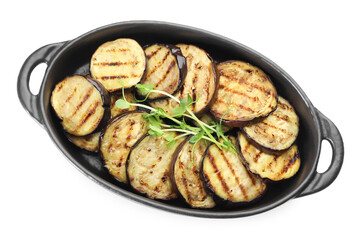 Grilled slices of eggplant with microgreens isolated on white, top view