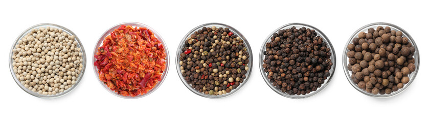 Different types of peppers, set. Spices isolated on white, top view
