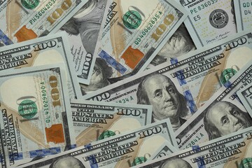 Big amount of american USD hunderd dollar bills banknotes close up