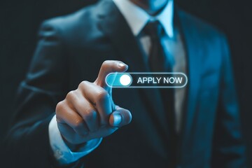 A businessman in a suit presses an illuminated apply now button on a futuristic digital interface