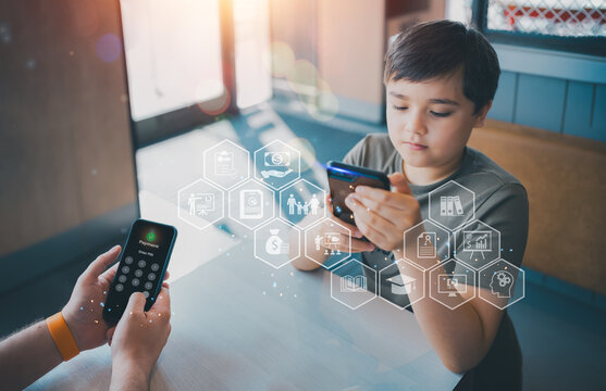 Father transferring money online to child using smartphone, symbolizing family support, digital finance, education funding and future investment in modern financial technology,Concept for Education