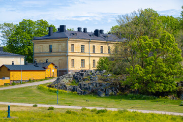 Fototapeta premium Suomenlinna fortress buildings exterior with orange bricks in Helsinki, Finland