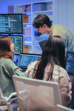 Young Asian man software developers mentor leader manager Verification and validation in software testing ensure developers drive the development of engineering technologies Programmer development