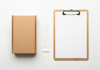 Top view of brown cardboard box, sealed cotton swab, and clipboard with white paper. Medical mock up for testing.
