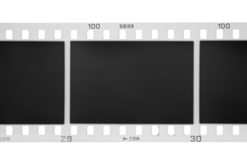 35mm photographic film with exposed frames isolated. Transparent PNG image.