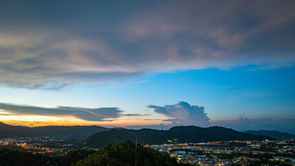Aerial view of Khao Rang Viewpoint at dusk an important landmark in Phuket TownKhao Rang Viewpoint offers a panoramic view and the twinkling lights of Phuket Town at night, which are beautiful.