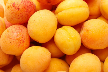 Fresh ripe sweet apricots as background, top view