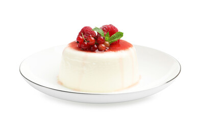 Delicious panna cotta with berries, sauce and mint isolated on white