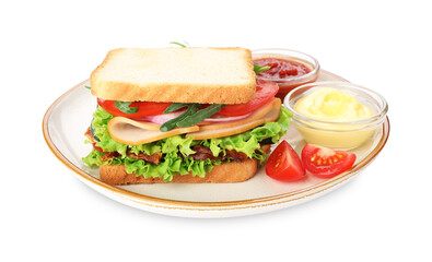 Tasty sandwich with ham, bacon, vegetables and sauces isolated on white