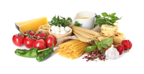 Different types of pasta and ingredients isolated on white