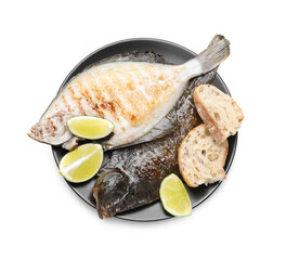 Tasty roasted flounder fish with bread and lime slices isolated on white, top view. Homemade seafood dish