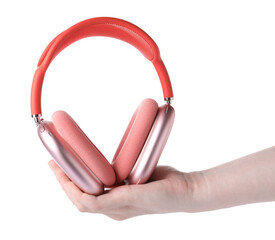 Woman with stylish pink headphones on white background, closeup