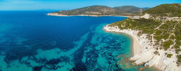 Fototapeta premium Breathtaking scenery of the Aegean sea with crystal clear turquoise water, white sand beaches and green hills