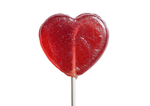 Close-up of a heart-shaped lollipop on a stick.  Red, glossy candy, slightly textured.  Against black background - Powered by Adobe