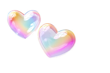 Two iridescent heart-shaped soap bubbles against a black background