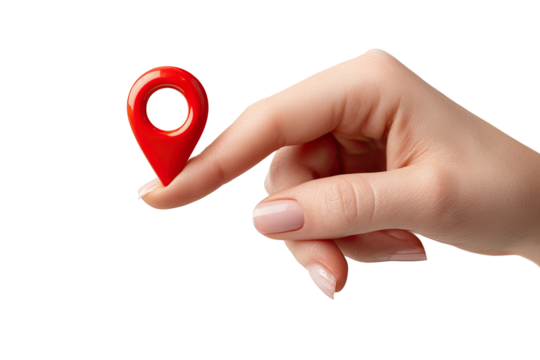 Close-up of a hand holding a small red map pin