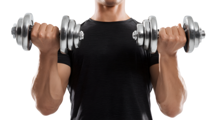 A man lifting dumbbells for shoulder exercises in a home gym