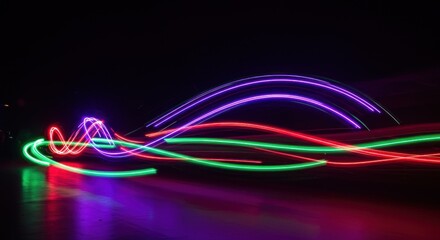 Colorful light trails on dark background
