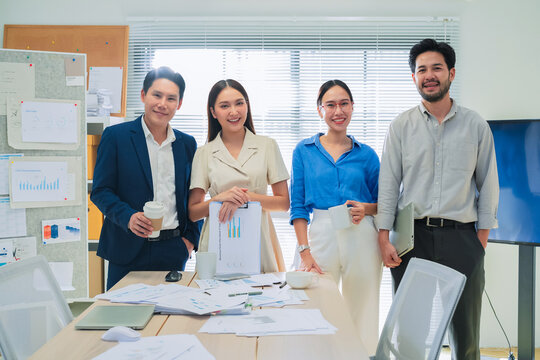 asian Portrait of business colleagues in modern office  group of business persons Confident business colleagues Portrait of young successful business team. Looking at camera in modern office interior