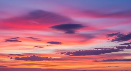 Obraz premium Breathtaking Sunset Sky with Vibrant Pink, Purple, and Orange Clouds