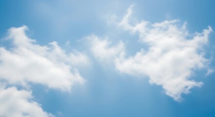 Obraz premium Beautiful summer day with bright blue skies and fluffy white clouds