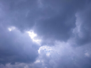 Fototapeta premium Dark Storm Clouds with Light Breaking Through