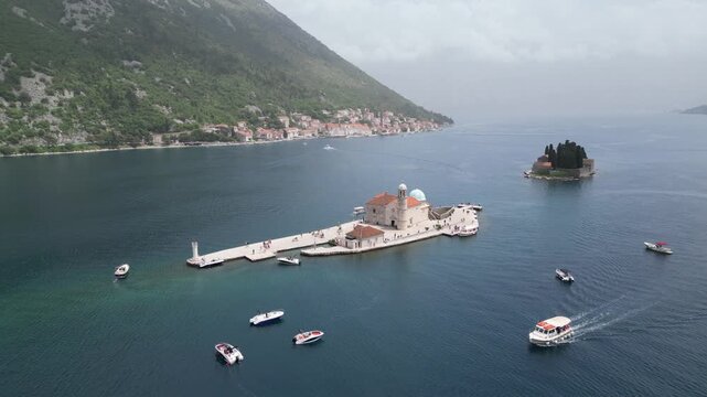 4K aerial drone video flying over Saint George Monastery island in Bay of Kotor Montenegro