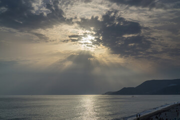 Evening sea and beach, sunset over Cleopatra beach in Alanya.