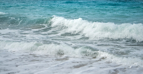 Powerful ocean waves crashing on the shore