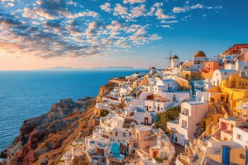 Obraz premium Stunning views of Santorini, Greece at sunset with vibrant buildings overlooking the Aegean Sea