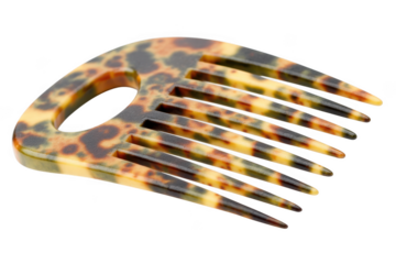 Tortoise shell hair comb isolated on transparent background