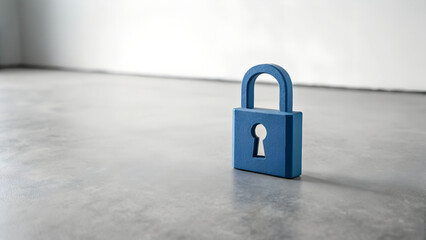 Blue padlock standing on gray concrete floor in minimal studio lighting symbolizing safety, privacy, protection, access control, security system and digital data safeguarding concept 