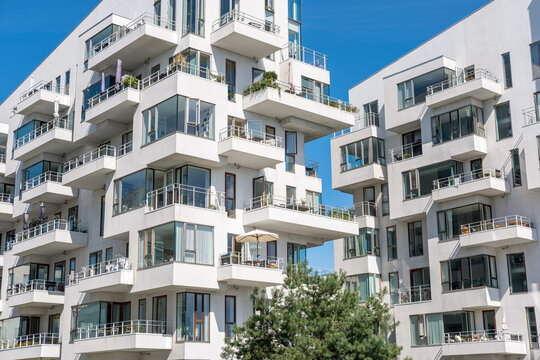 Modern white multifamily residential building seen in Copenhagen, Denmark