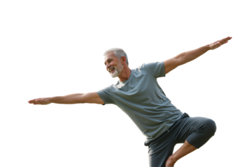A healthy senior man with a cheerful smile displays impressive balance in a dynamic pose, embodying an active lifestyle and overall well-being.