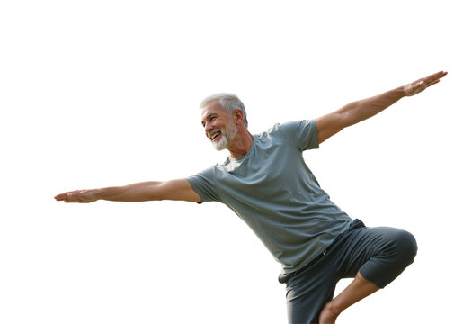 A healthy senior man with a cheerful smile displays impressive balance in a dynamic pose, embodying an active lifestyle and overall well-being.