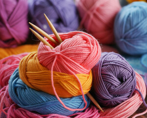 Colorful yarn balls with knitting needles wool craft