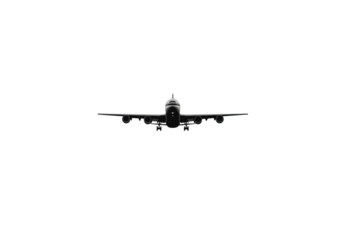 Silhouette of a commercial airplane flying at night isolated on transparent background