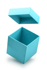 Open empty blue gift box and lid floating above a box isolated on white background. File contains clipping path.