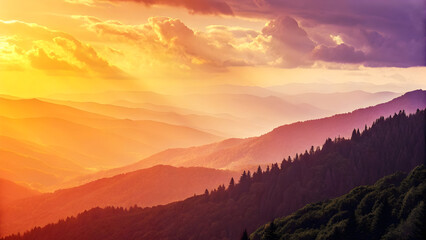Vibrant mountain range layered with golden orange and purple sunset light and clouds image