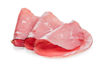 Slices of smoked bresaola isolated on white background.