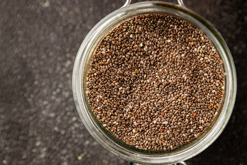 Chia seeds healthy superfood tasty snack fresh delicious gourmet food background on the table rustic food top view copy space keto and paleo diet vegan and vegetarian food