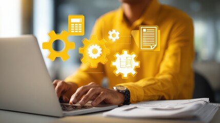 Digitized Work: An office worker in a yellow shirt and dark hair engages with their laptop with overlaid graphics to convey the digital work process, emphasizing productivity.