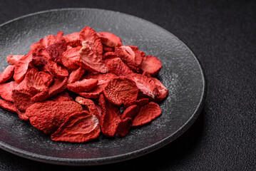 Dried sublimated slices of strawberry as an ingredient for sweet desserts. Dried strawberry