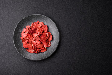 Dried sublimated slices of strawberry as an ingredient for sweet desserts. Dried strawberry