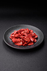 Dried sublimated slices of strawberry as an ingredient for sweet desserts. Dried strawberry